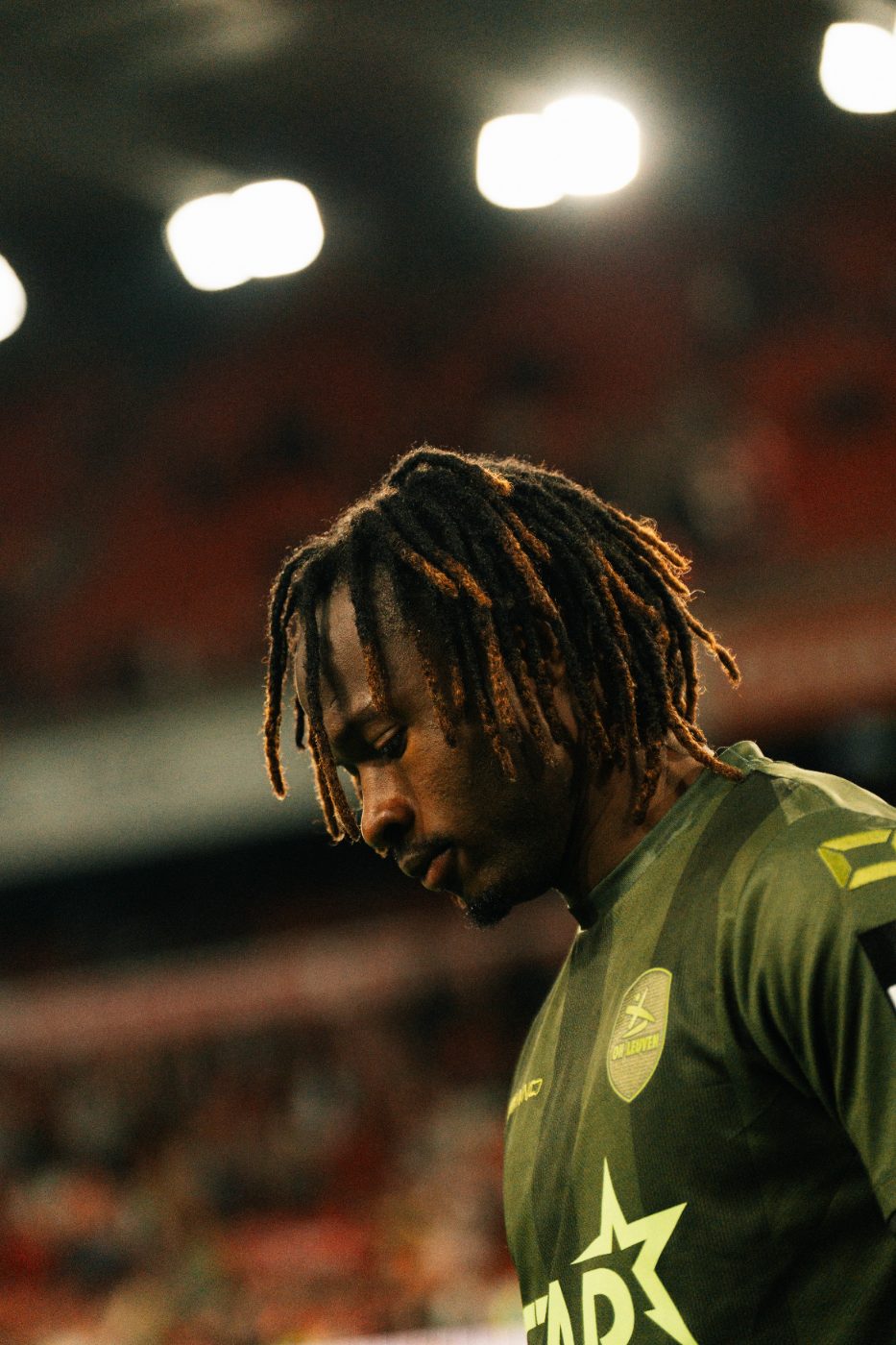 a player in close-up under the floodlights