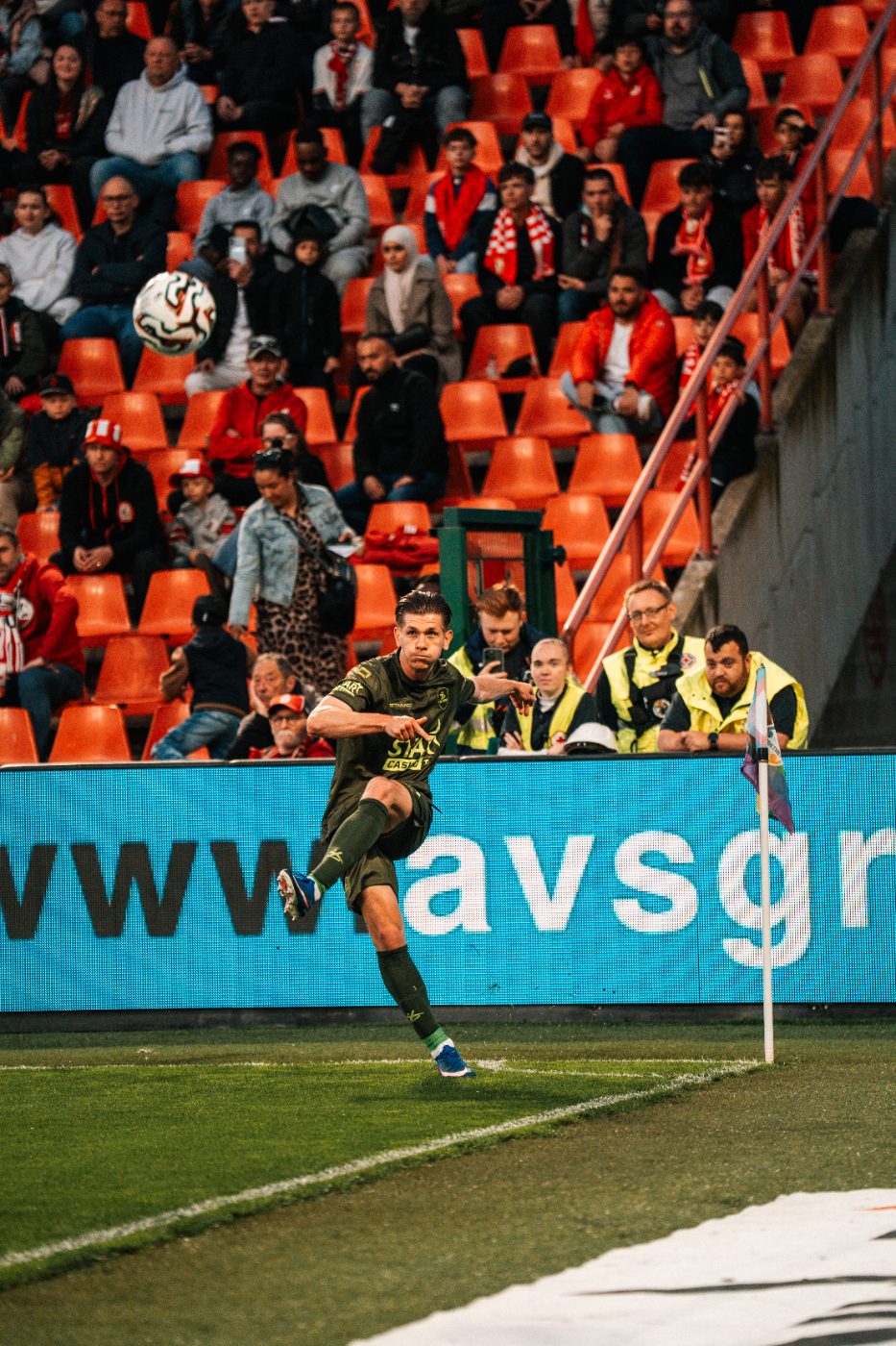 rising for a header under the lights